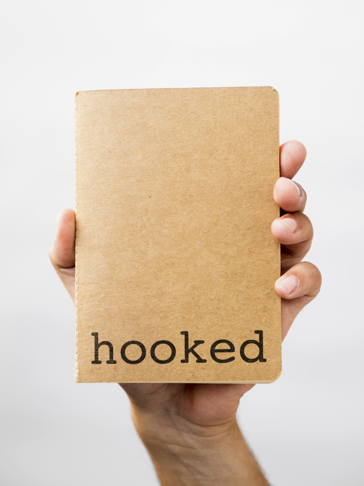 Person holding a sketch book